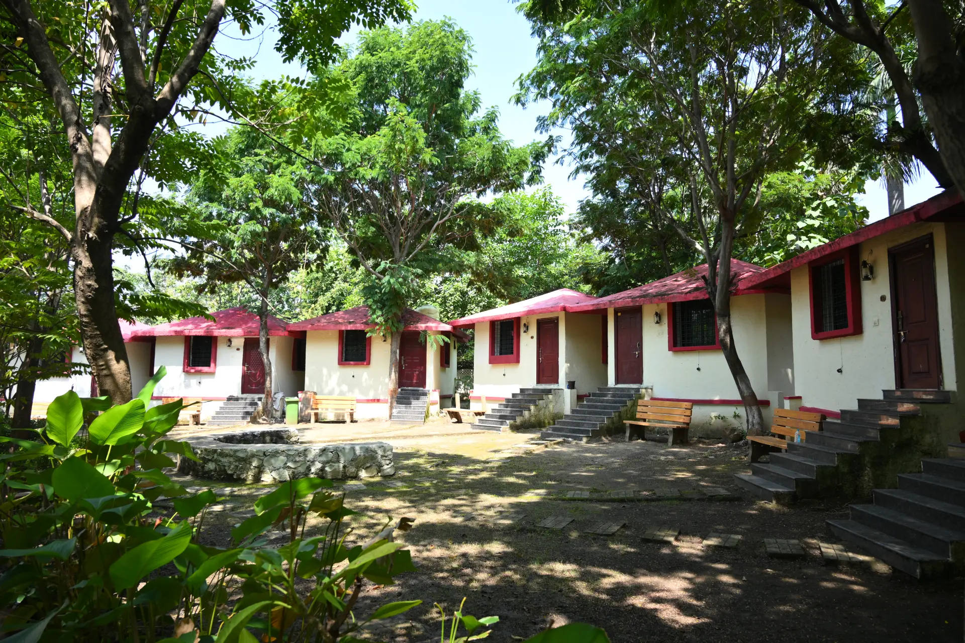 A modern villa with a swimming pool at dusk.